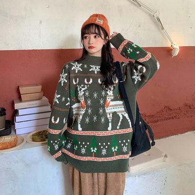 Women's knitted Christmas jumper with two Fair Isle reindeer, snowflakes and trees