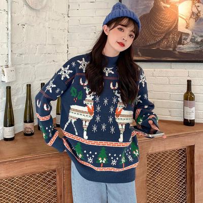 Women's knitted Christmas jumper with two Fair Isle reindeer, snowflakes and trees