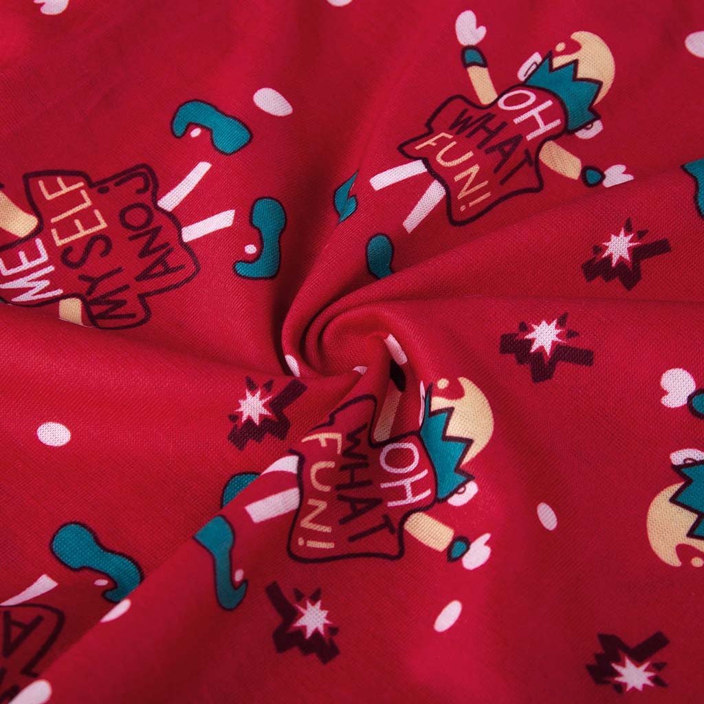 Red family Christmas onesie with an elf print and a hood with elf ears