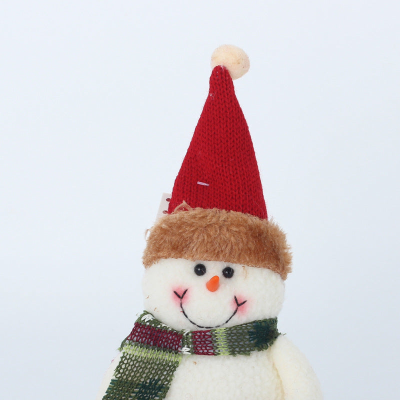 Plush Father Christmas and snowman in knitted hats, each with a Wish List pouch