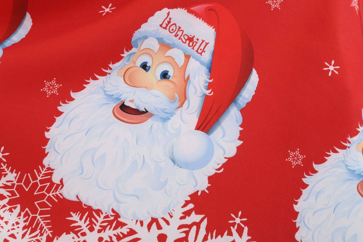 Women's Christmas swing dress with Father Christmas faces and a snowflake hem