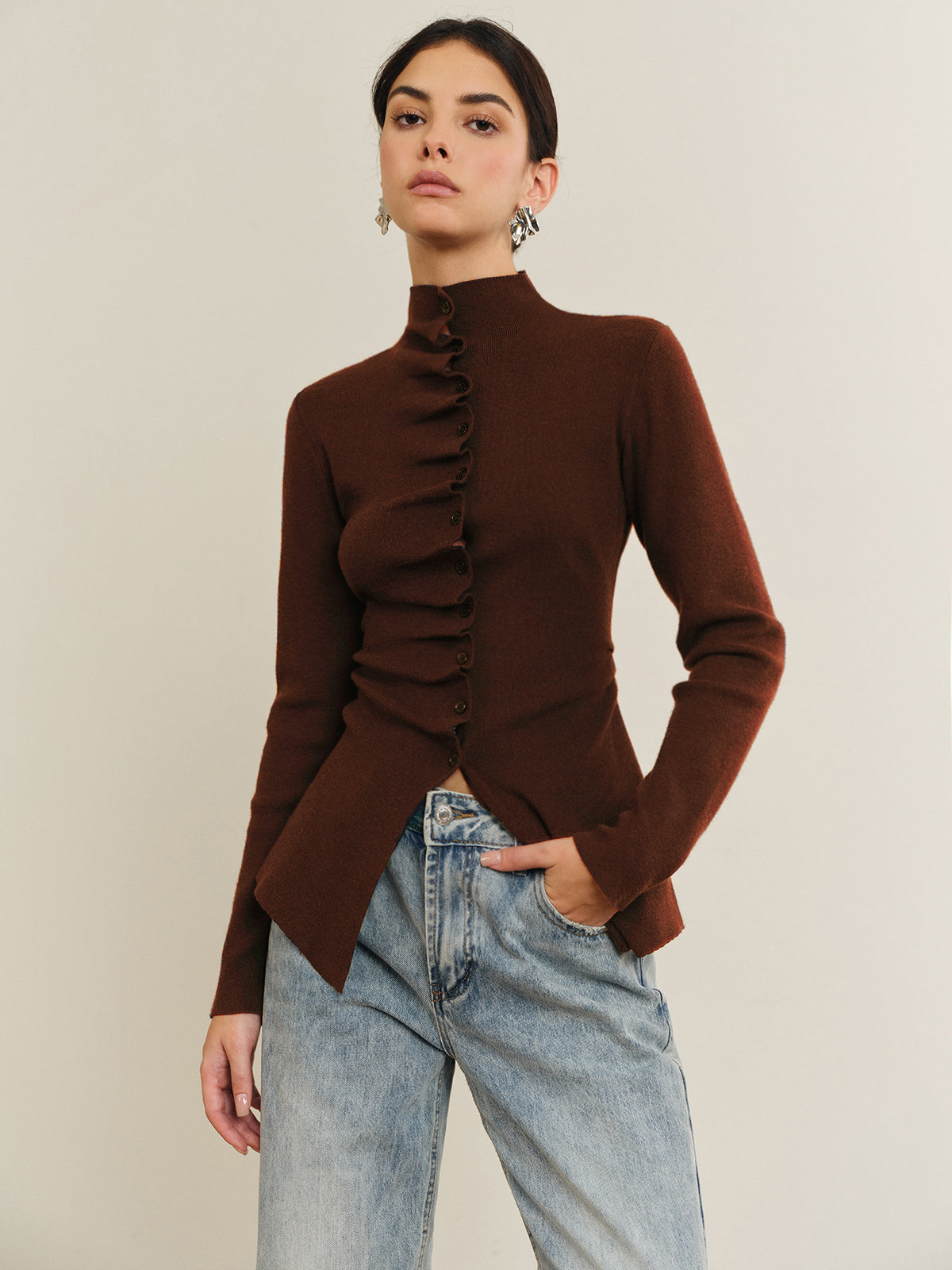 Women's fitted cardigan with a mock neck and pleated button front