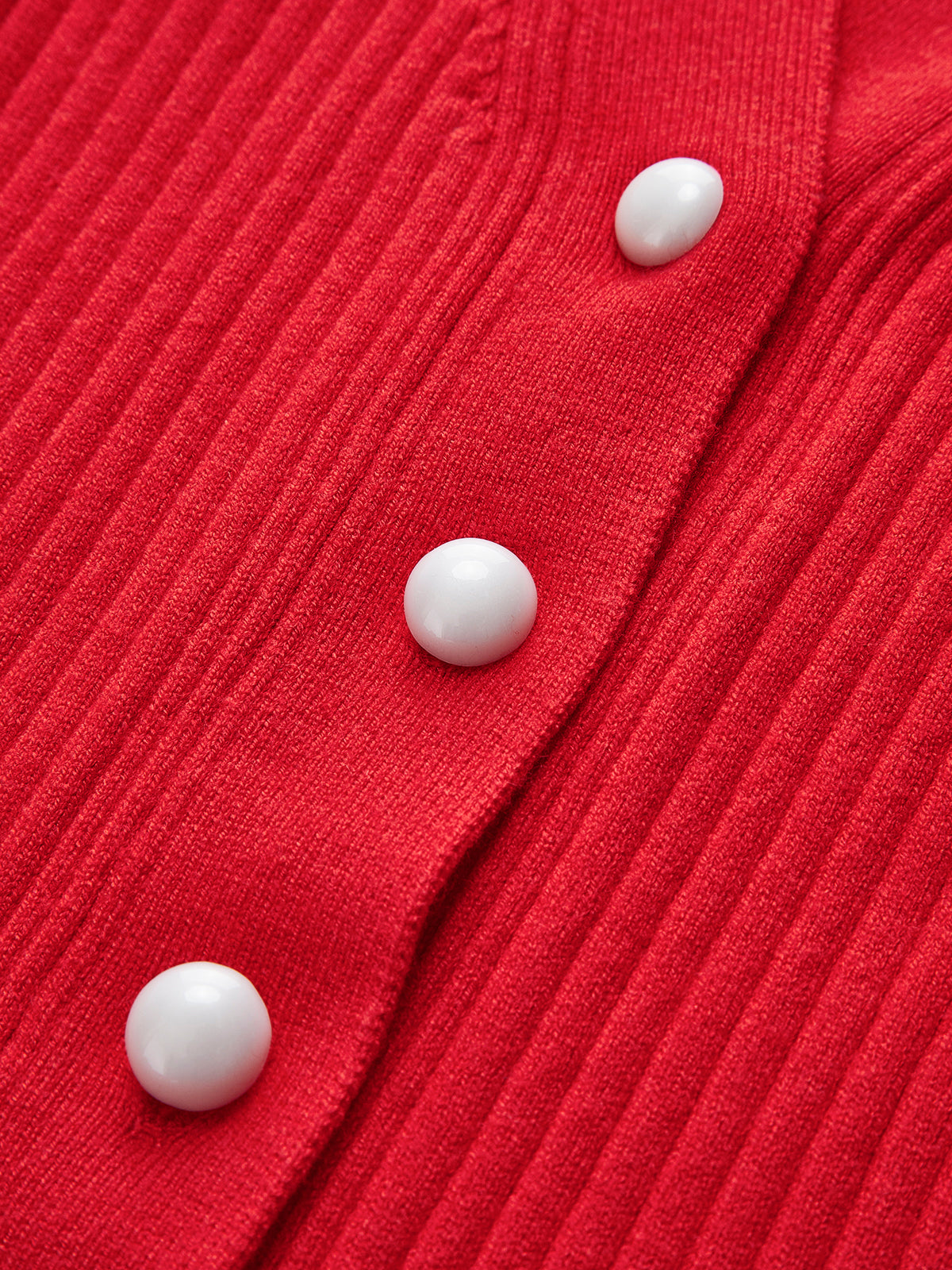 Women's fitted ribbed cardigan with a V-neck, pearl-look buttons and ruffle hem