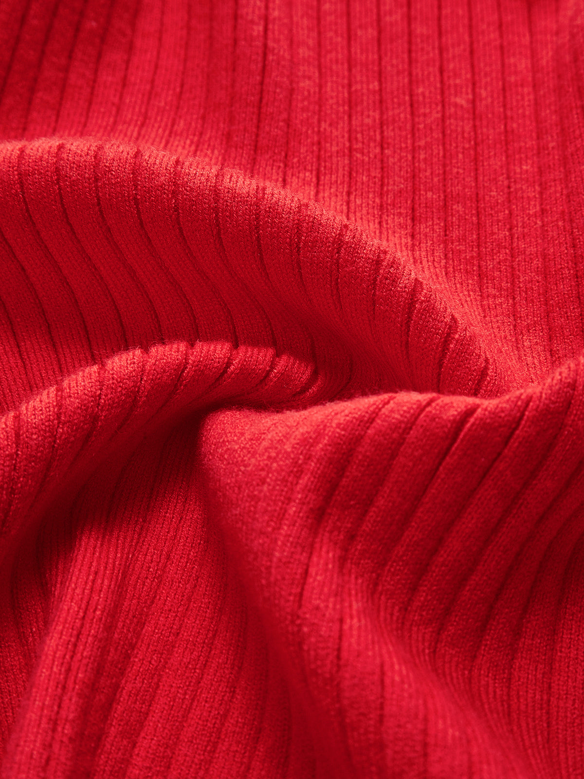Women's fitted ribbed cardigan with a V-neck, pearl-look buttons and ruffle hem