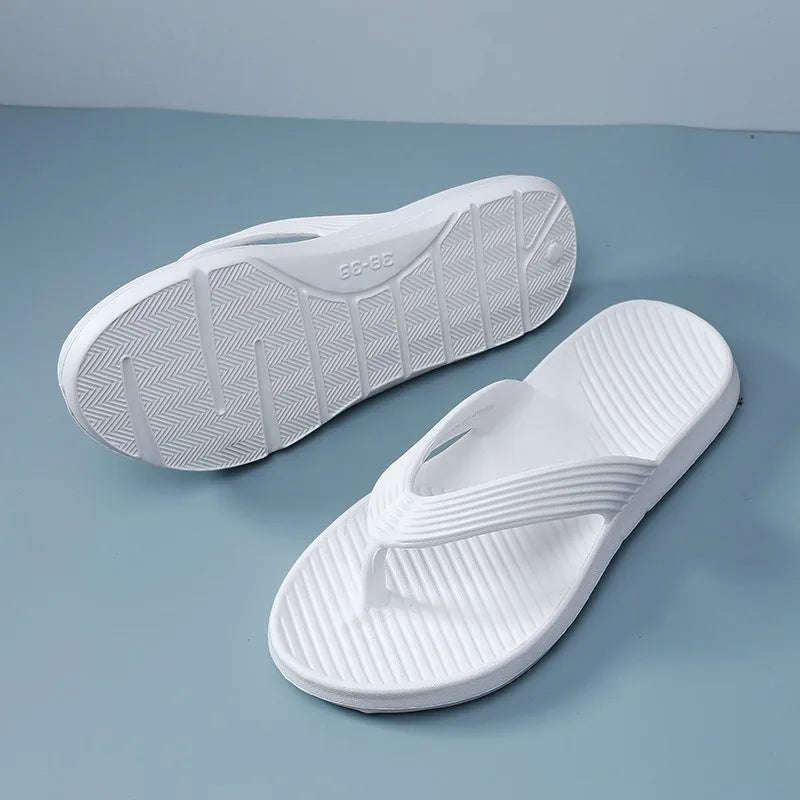 EVA flip flops with a thick sole, ribbed strap and a footbed with diagonal ridges - view 4