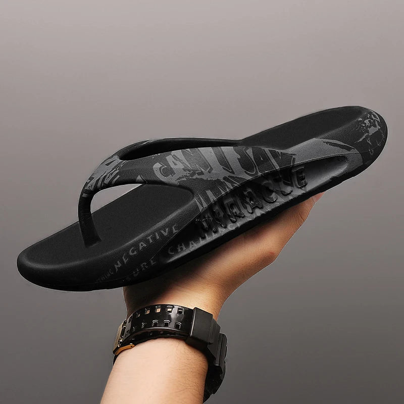 Flip flops in EVA with thick sole and letter print across straps and footbed