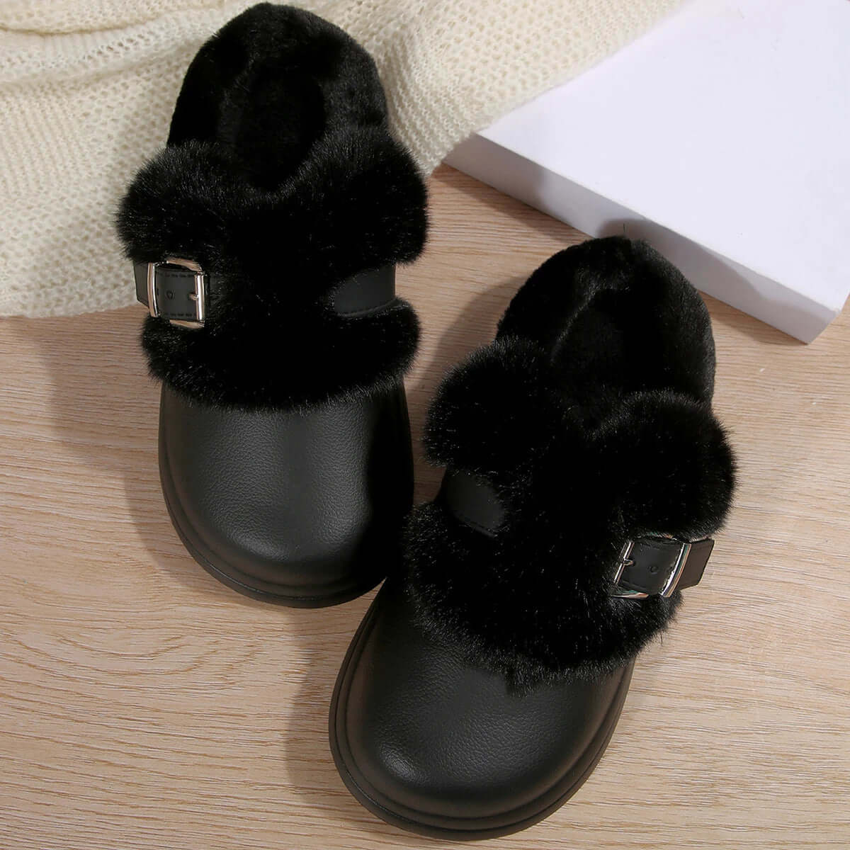 Women's fluffy EVA clog slippers with a wide faux fur band, buckle and thick sole - black