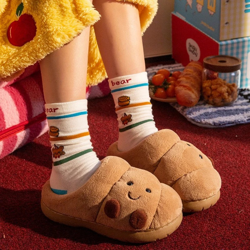 Fluffy slippers shaped like a croissant with stitched face, teddy lining and thick sole - view 2