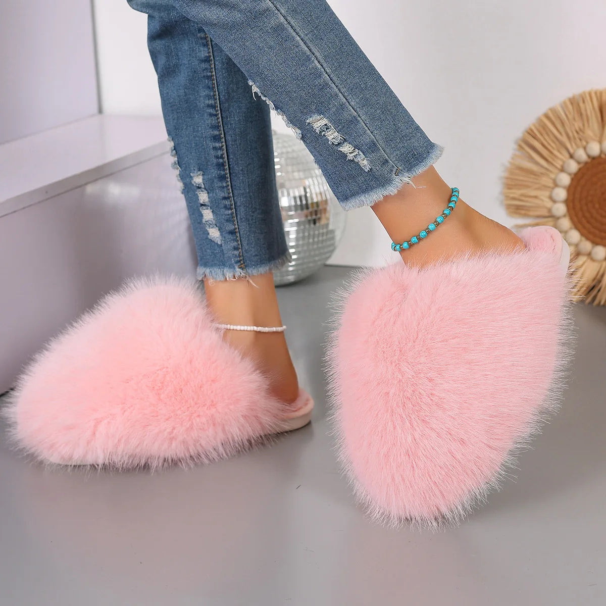 Fluffy slippers with a long faux fur upper, open back and rubber sole - pink