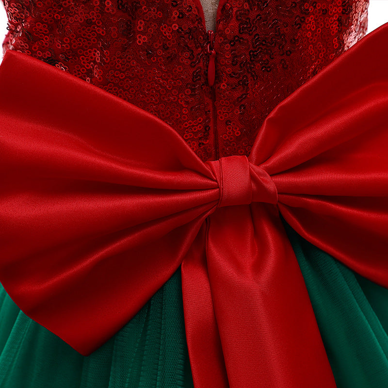 Girls' Christmas party dress with a sequinned bodice, tulle skirt and big bow