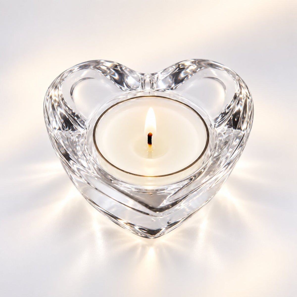 Handmade tea light holder in thick, clear glass - heart