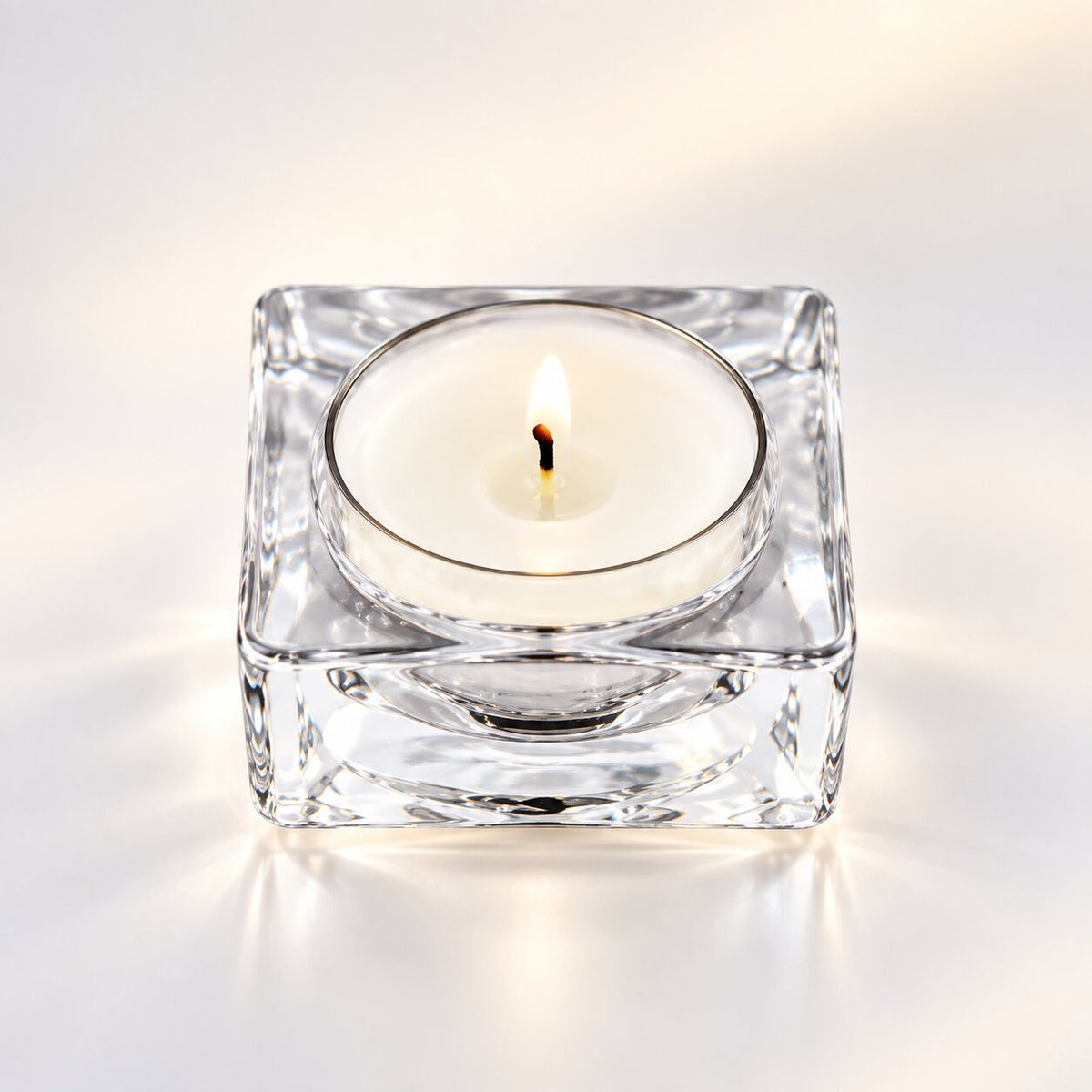 Handmade tea light holder in thick, clear glass - square
