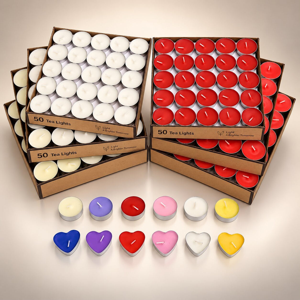 Coloured heart-shaped and round tea lights in cardboard boxes