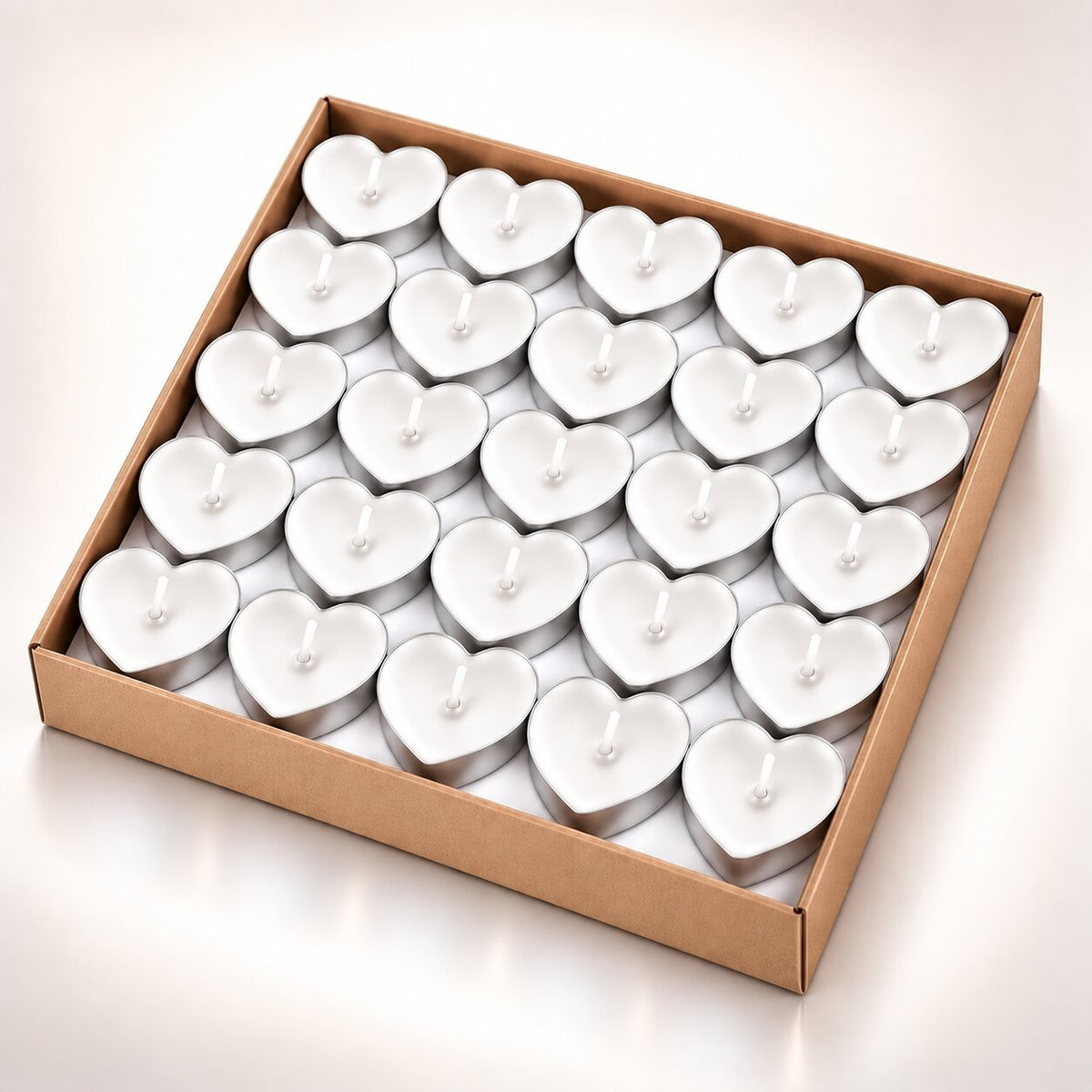 Coloured heart-shaped and round tea lights in cardboard boxes - view 10