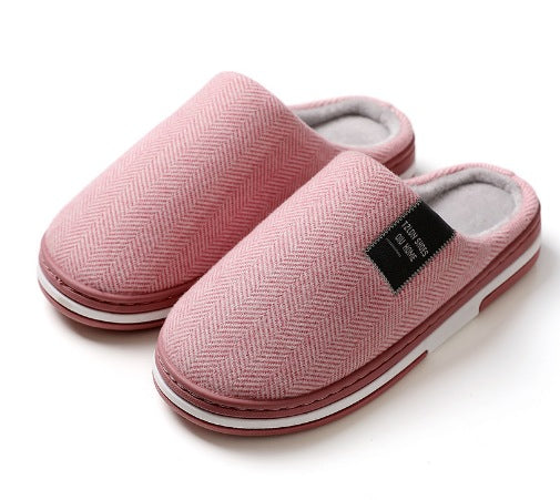 Slippers with a herringbone upper, open heel, plush lining and a white-striped sole - pink