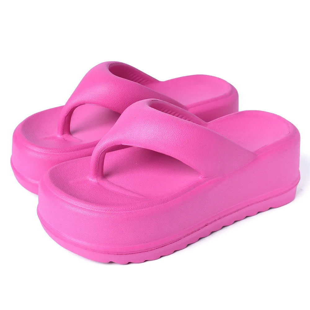 High platform flip flops in EVA with a thick toe-post strap - fuchsia