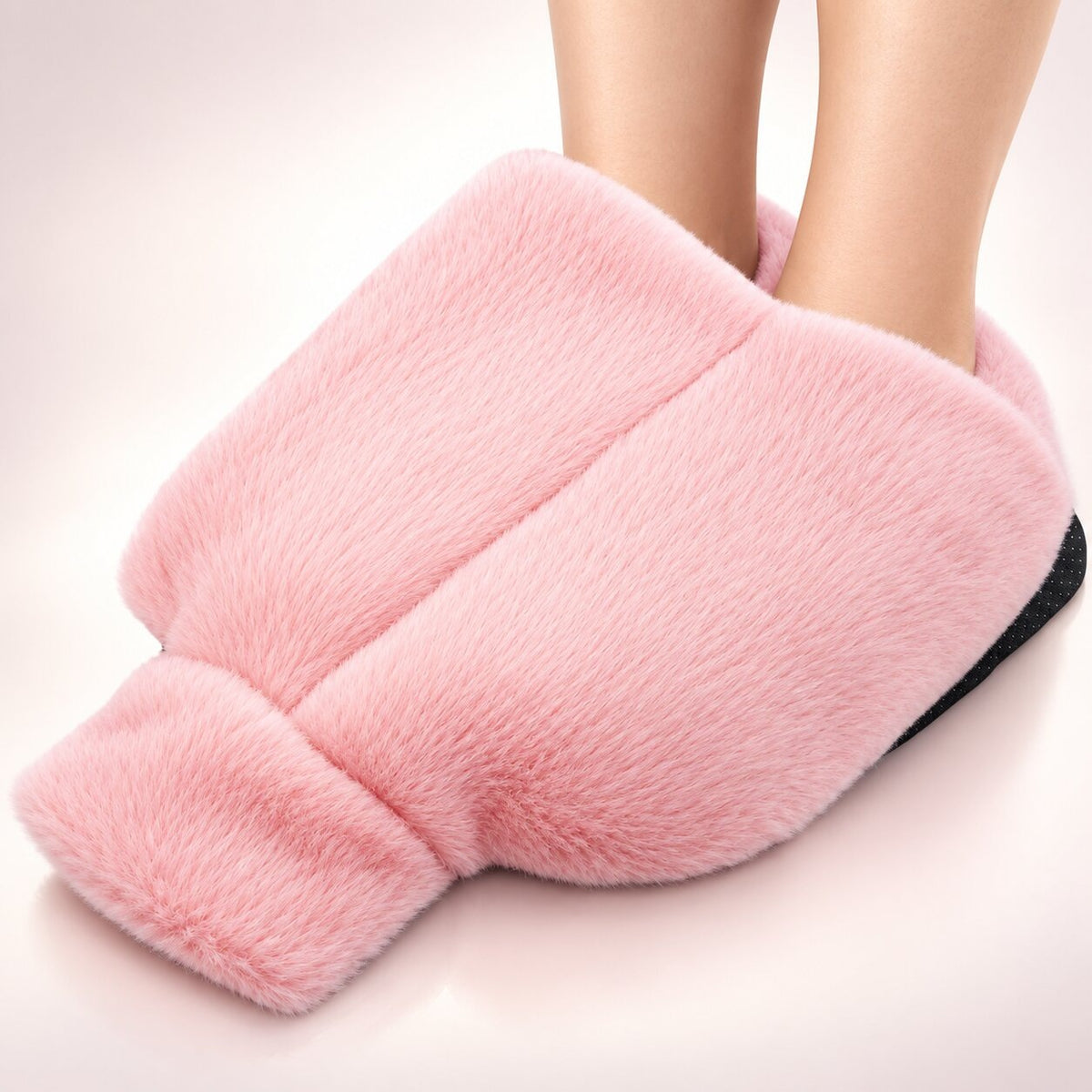 Hot water bottle foot warmer with a plush cover - pink