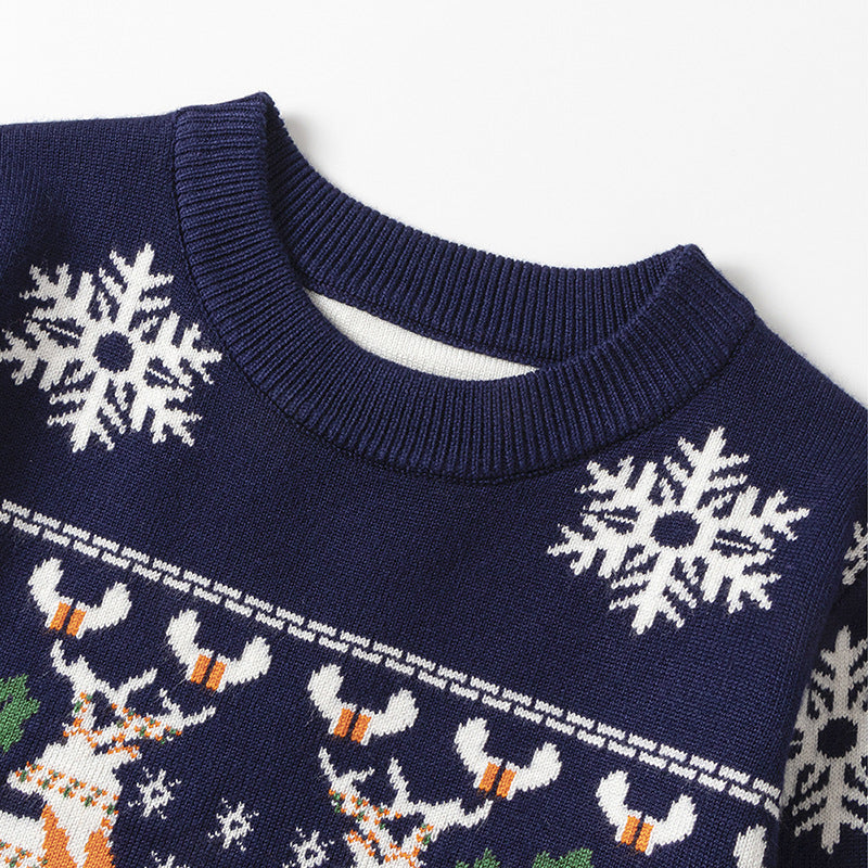 Kids' knitted Christmas jumper with a festive motif on the front