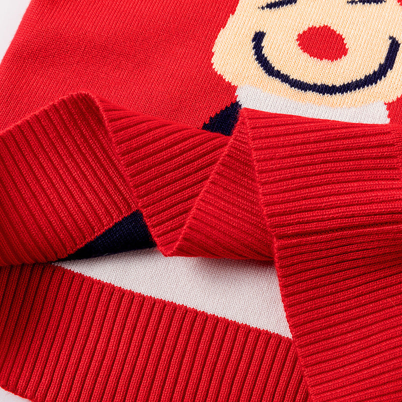 Kids' knitted Christmas jumper with a festive motif on the front