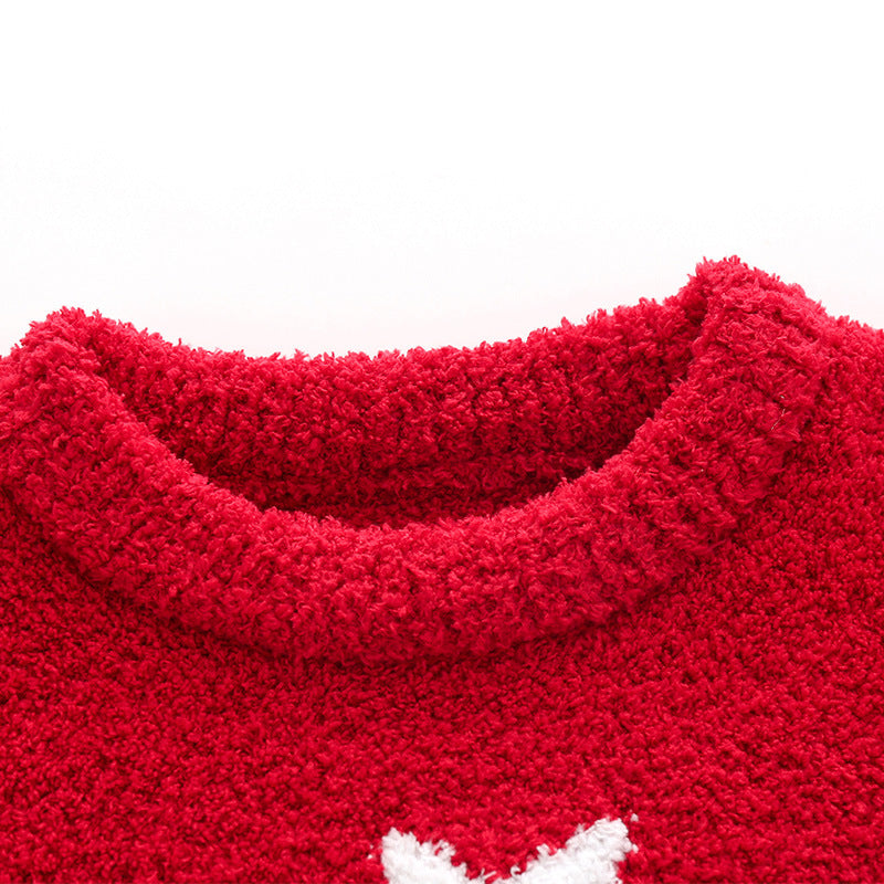 Kids' knitted Christmas pyjamas with a tree on the jumper and plain red bottoms