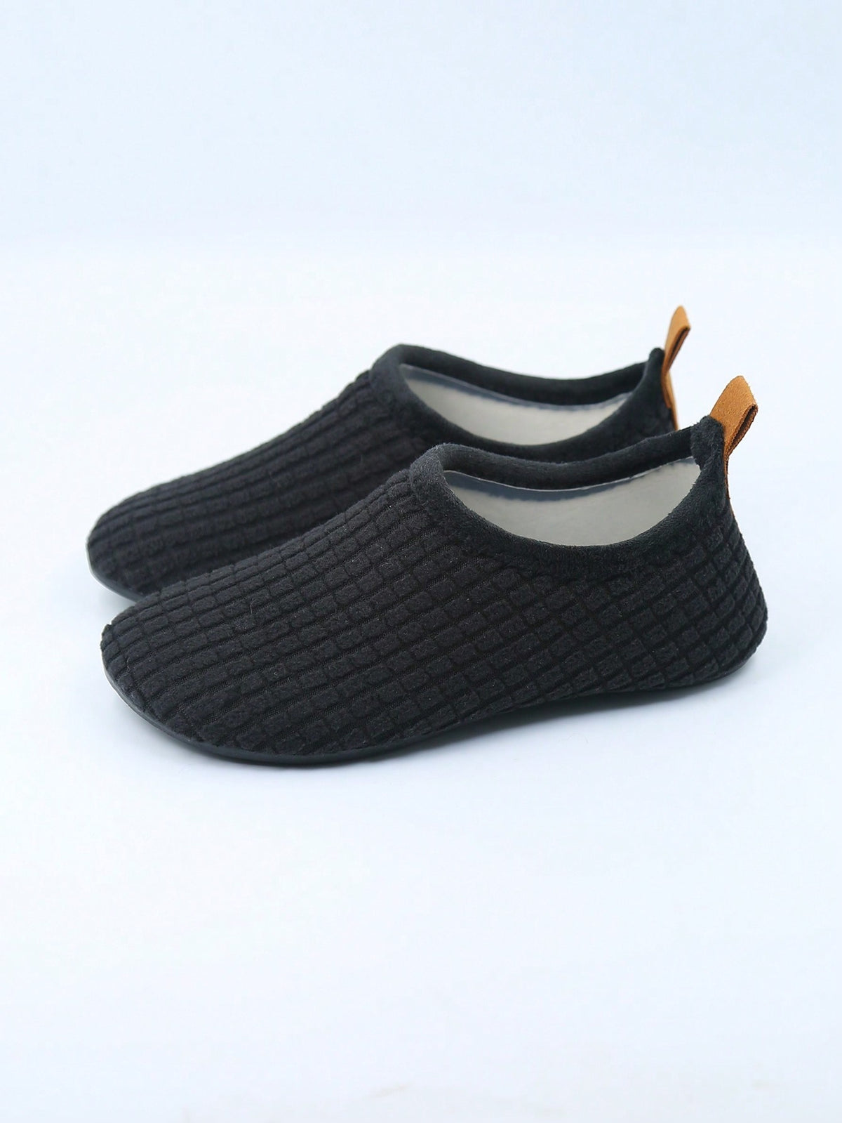 Slipper socks for kids with a soft lined upper, thin rubber sole and a pull-on loop at the heel - view 4