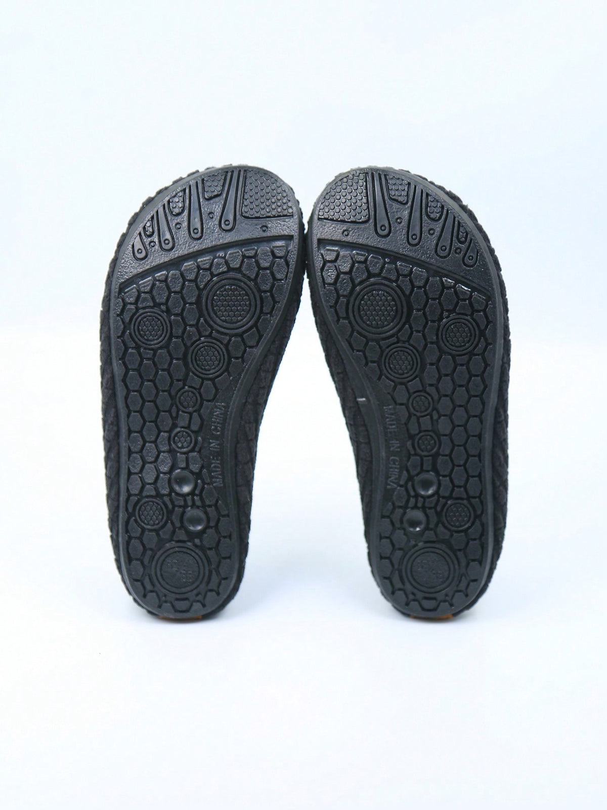 Slipper socks for kids with a soft lined upper, thin rubber sole and a pull-on loop at the heel - view 5