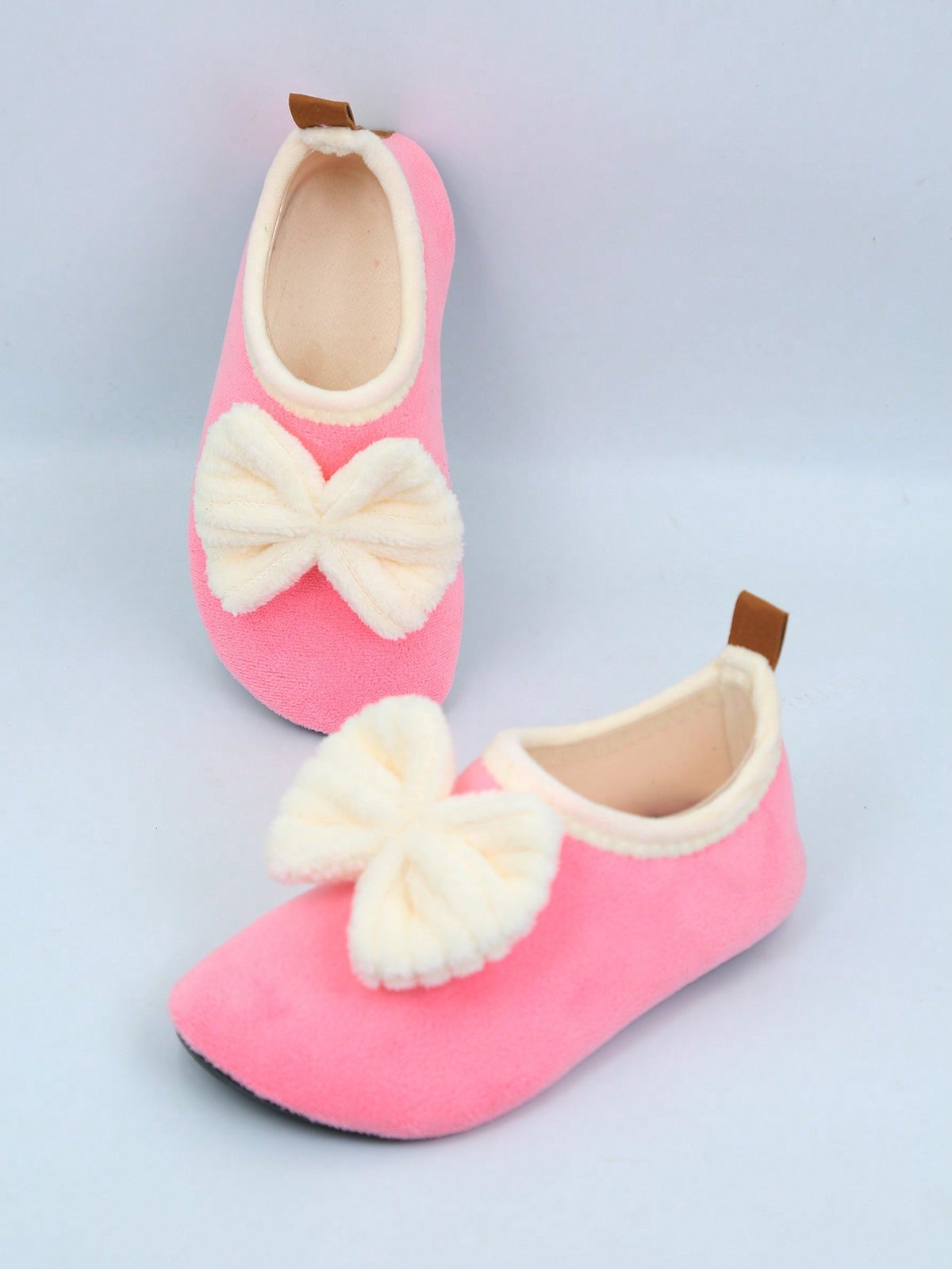 Slipper socks for kids with a soft lined upper, thin rubber sole and a pull-on loop at the heel - view 7