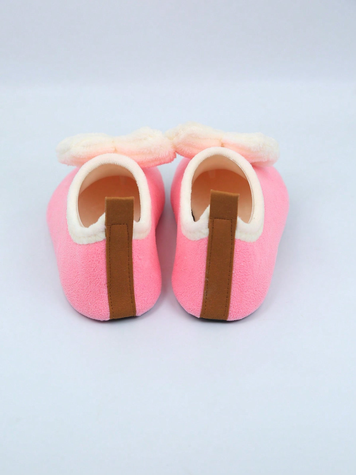 Slipper socks for kids with a soft lined upper, thin rubber sole and a pull-on loop at the heel - view 8