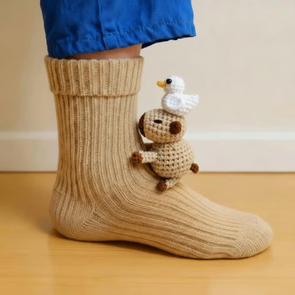 Knitted animal socks with a 3D animal hugging the leg - capybara