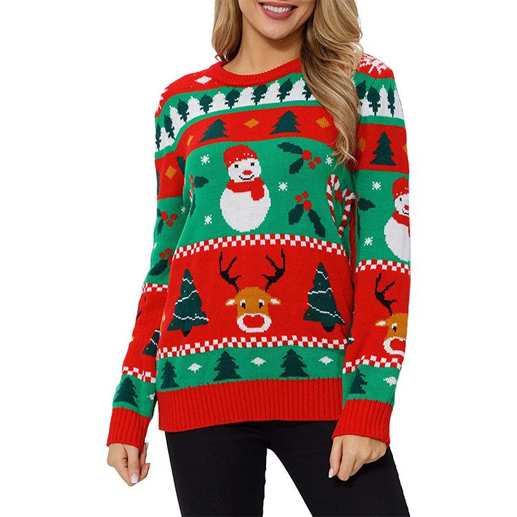 Women's red knitted Christmas jumper with a festive motif and fairy lights