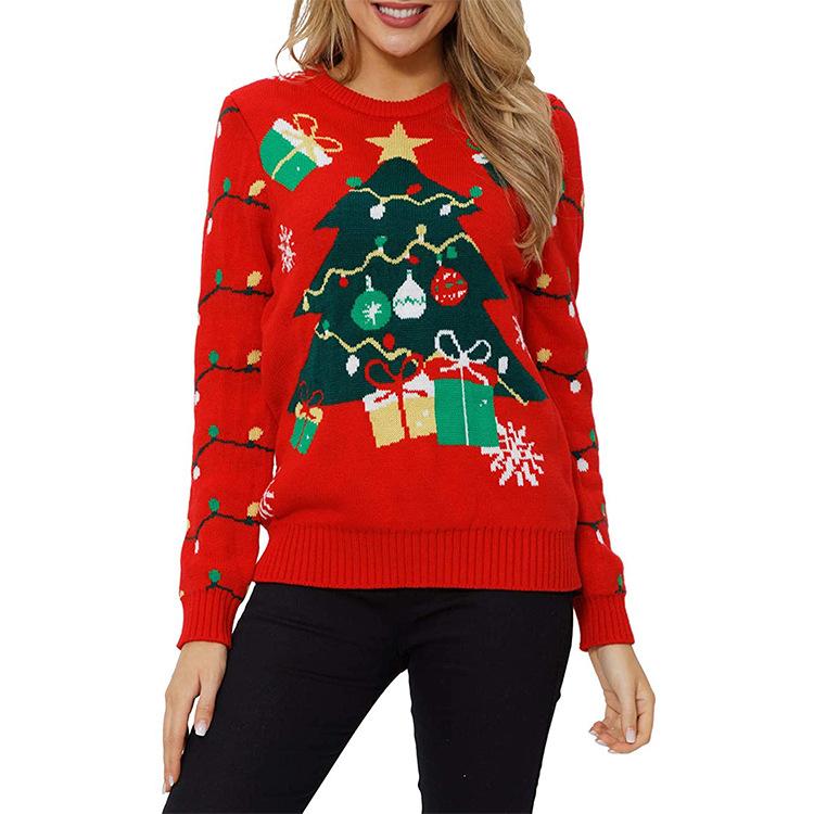 Women's red knitted Christmas jumper with a festive motif and fairy lights - red christmas tree