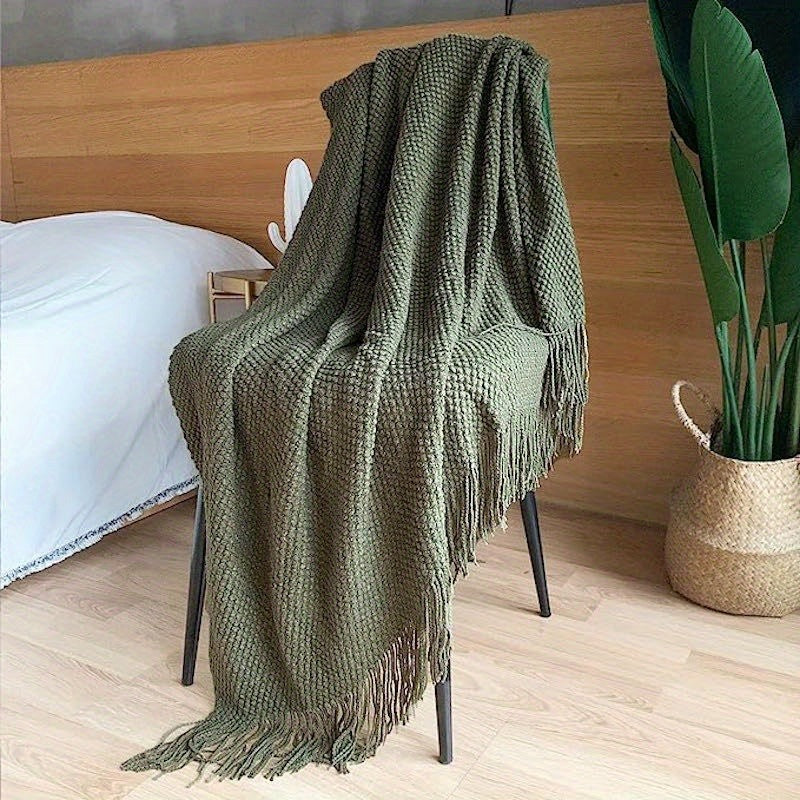 Knitted throw with a bobble texture and fringes - olive green