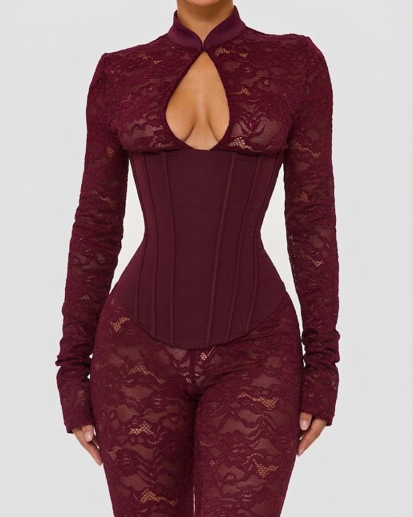 Lace jumpsuit with a high neck, boned corset bodice and calf-length legs
