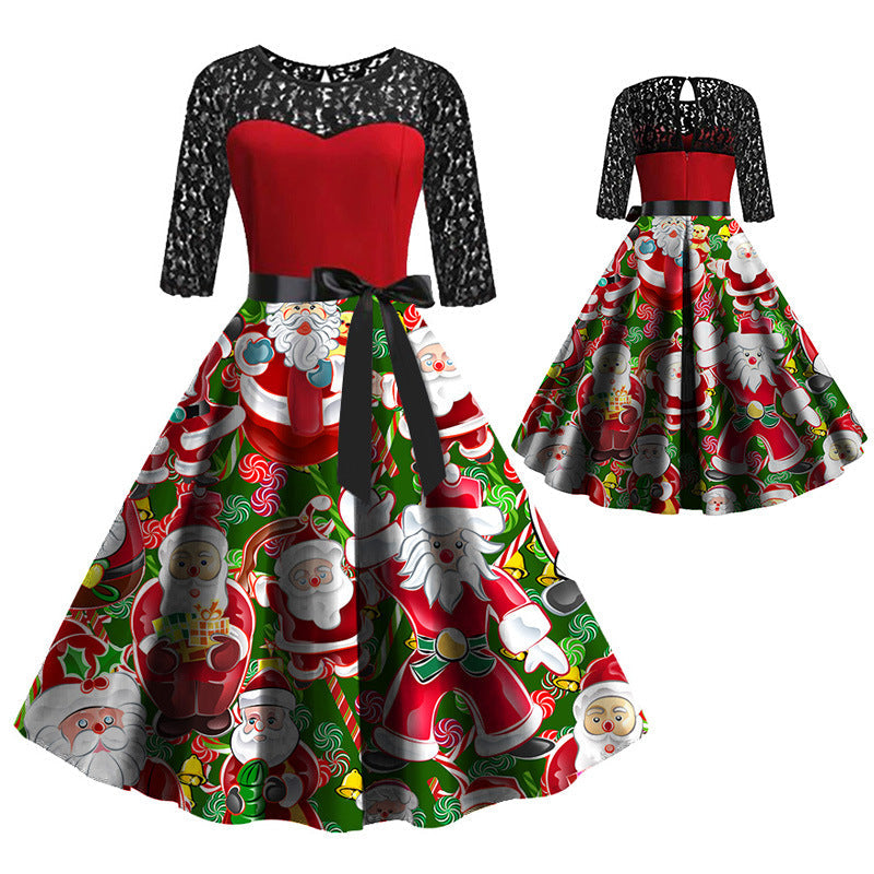 Women's Christmas dress with black lace sleeves, red bodice and Santa-print skirt