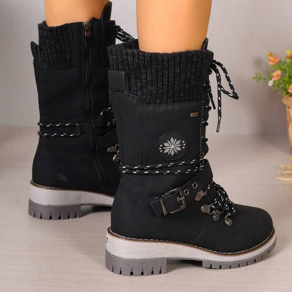 Women's lace-up winter boots with a knitted cuff and buckle