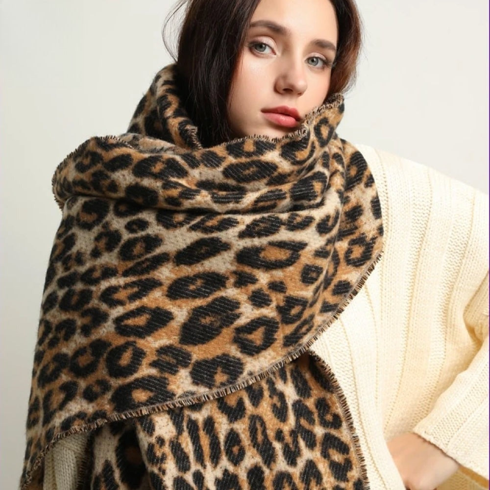 Women's woven leopard print scarf with twisted fringe