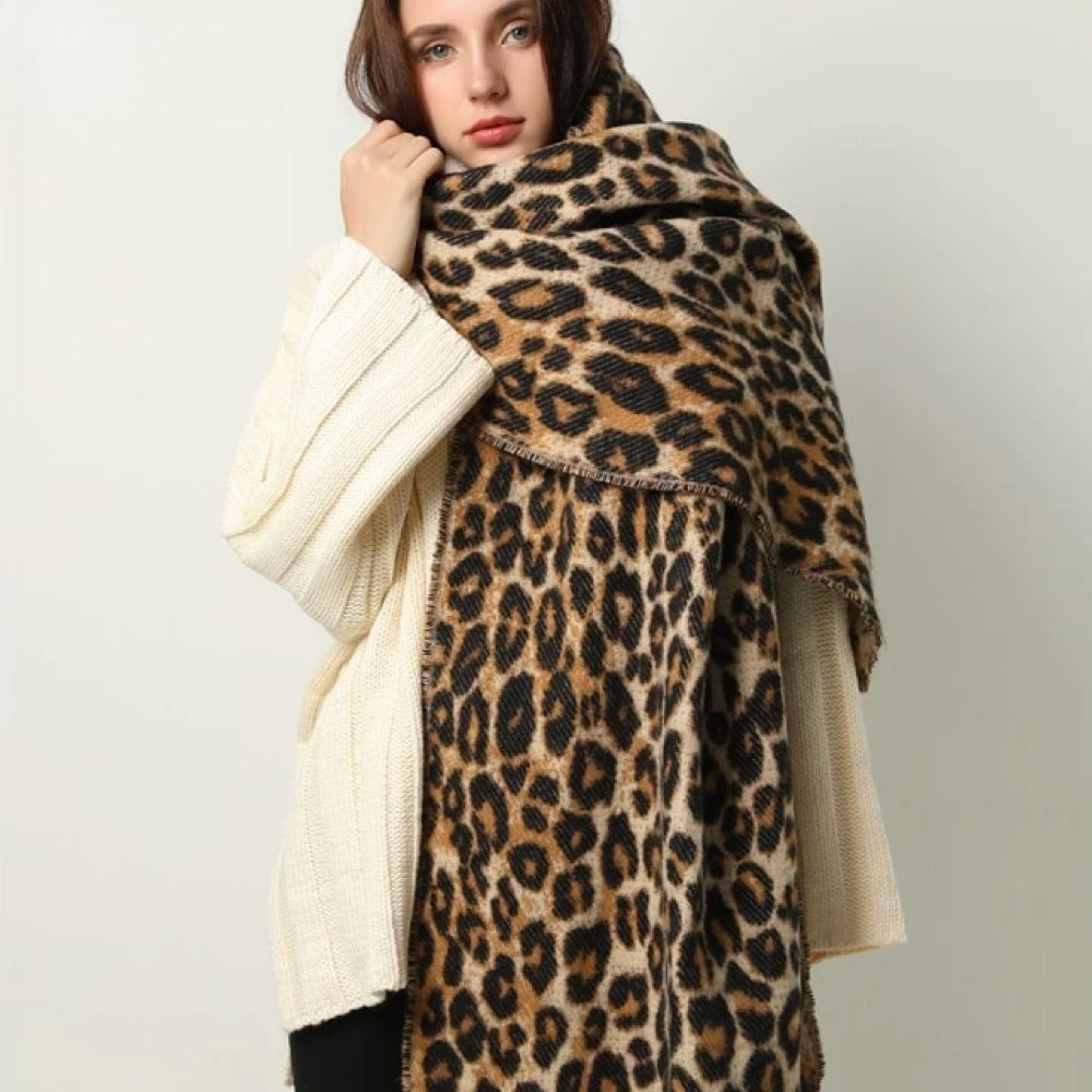 Women's woven leopard print scarf with twisted fringe