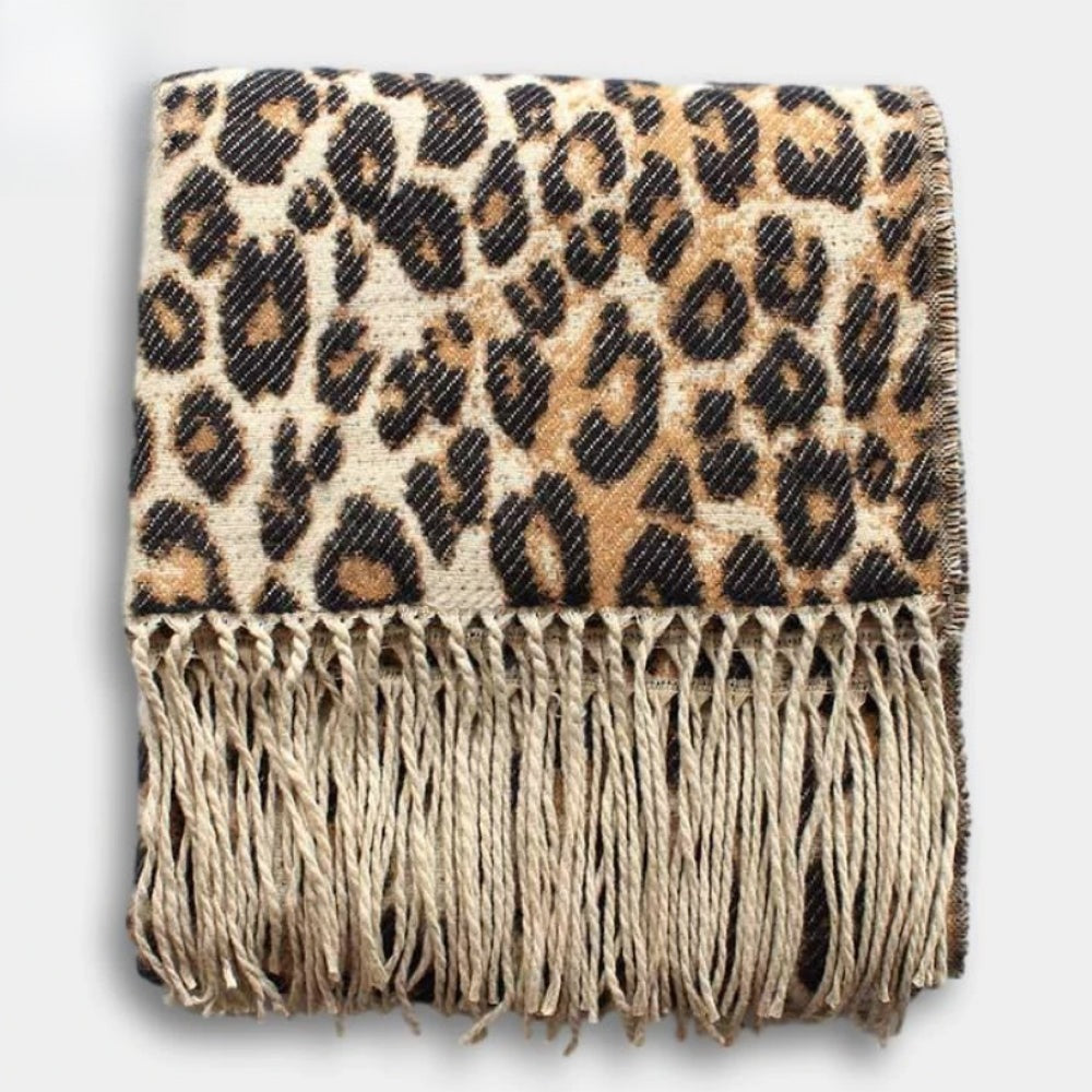 Women's woven leopard print scarf with twisted fringe