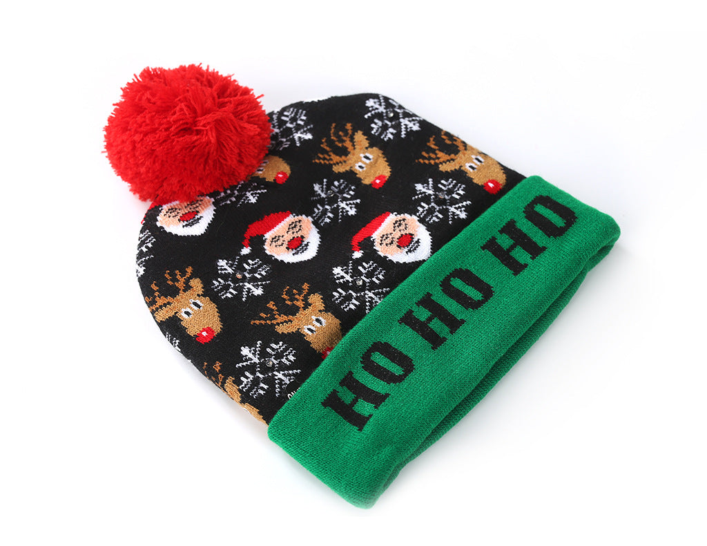 Knitted light-up Christmas beanie with a lettered turn-up and big pompom