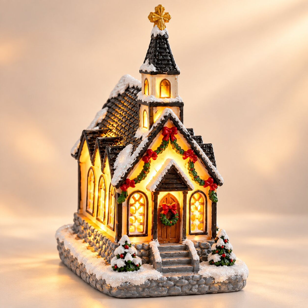 Light-up Christmas house with snow on the roof - christmas chapel