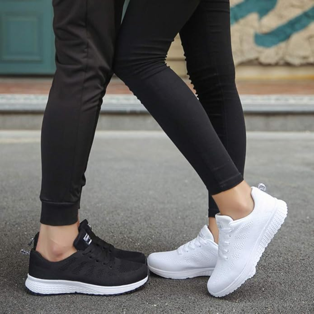 Women's lightweight knit trainers with a white foam sole