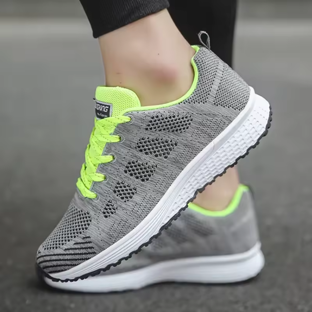 Women's lightweight knit trainers with a white foam sole