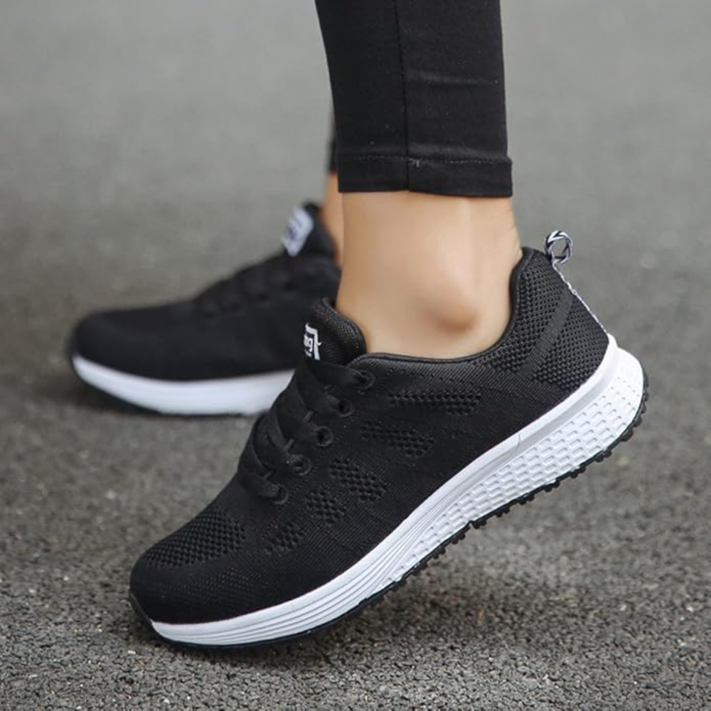 Women's lightweight knit trainers with a white foam sole