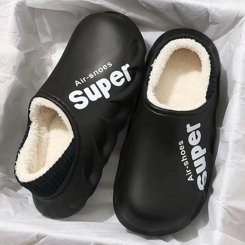 Lined EVA slippers with a big letter print, ribbed collar and plush lining - black