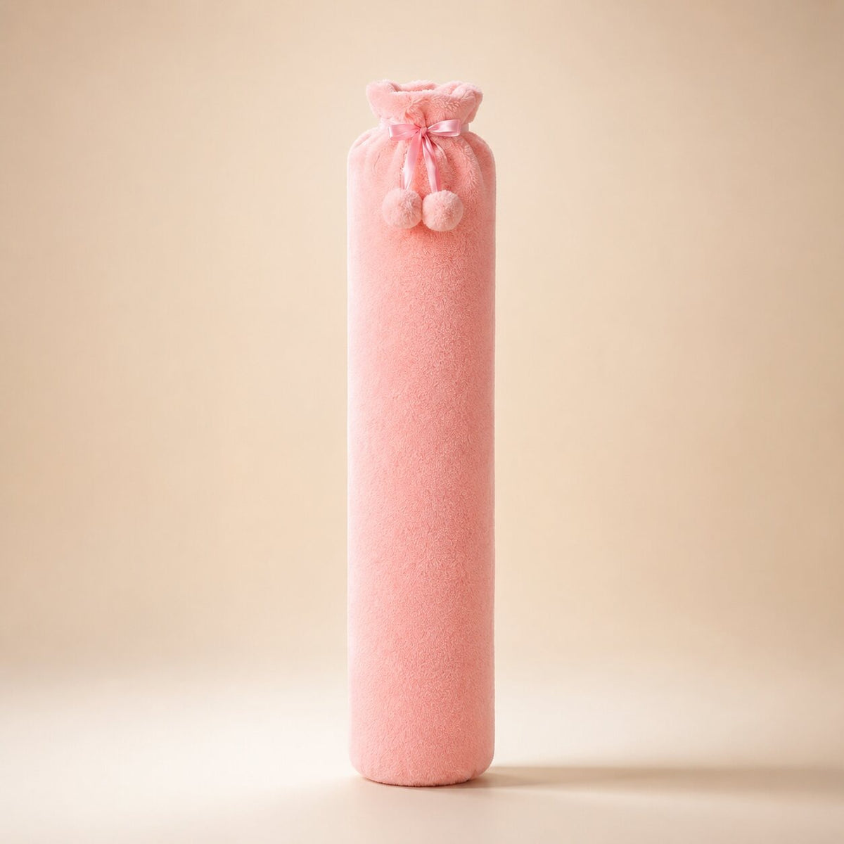 Long hot water bottle with a plush cover and pompoms, small or large - pink, large