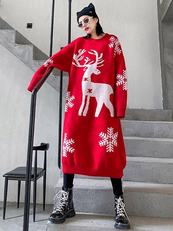 Women's longline oversized knitted Christmas jumper dress with a reindeer and snowflakes