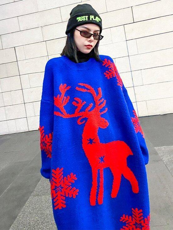 Women's longline oversized knitted Christmas jumper dress with a reindeer and snowflakes
