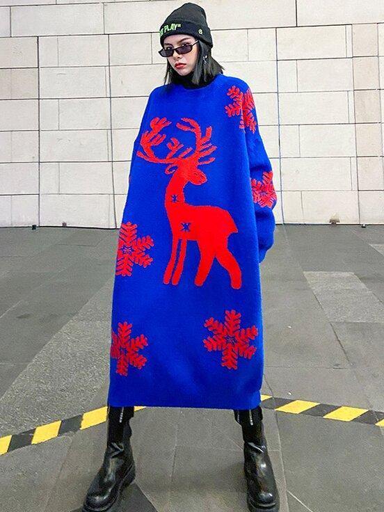 Women's longline oversized knitted Christmas jumper dress with a reindeer and snowflakes