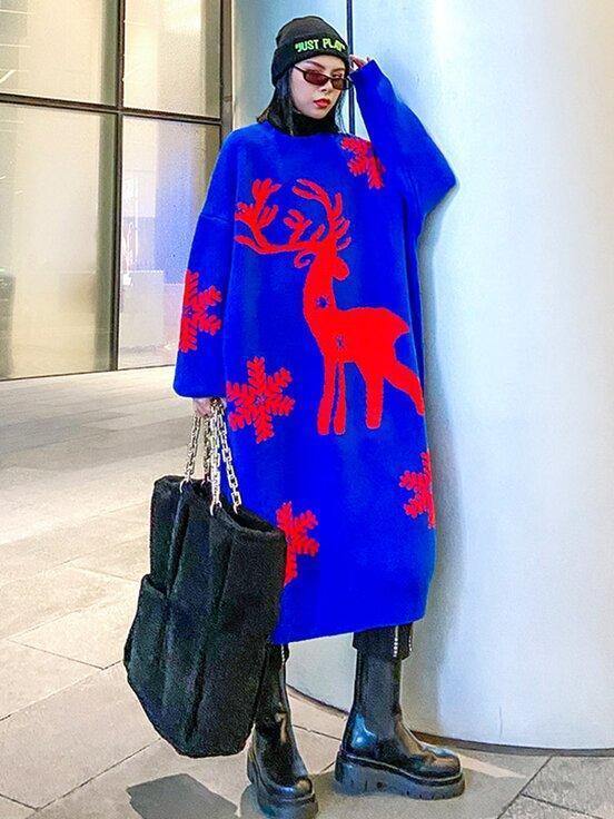 Women's longline oversized knitted Christmas jumper dress with a reindeer and snowflakes
