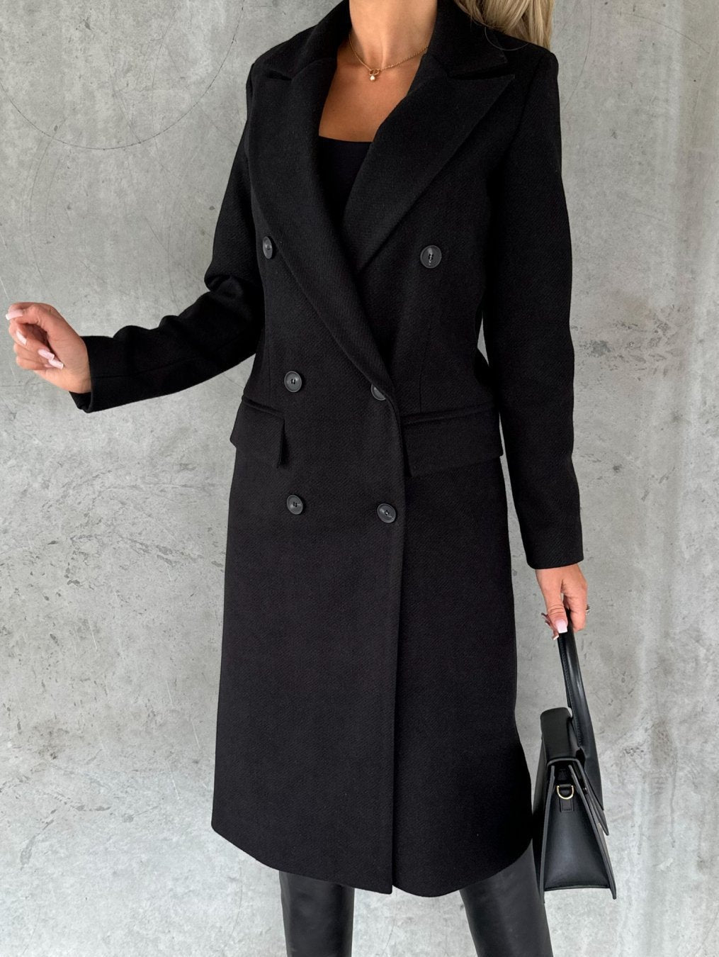 Women's longline double-breasted coat with peak lapels and flap pockets - black